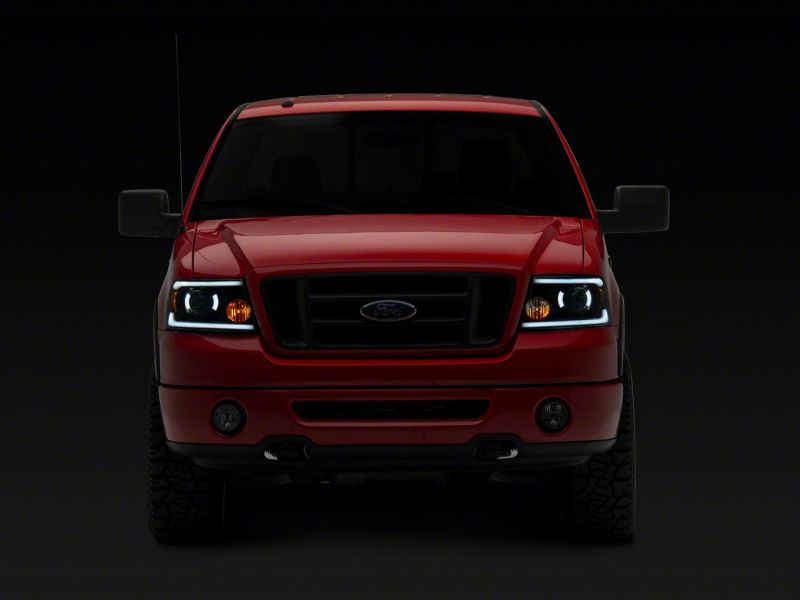 04-08 Ford F-150 Raxiom T566364 Axial Series Projector Headlights w/ SEQL LED Bar- Blk Housing (Clear Lens)